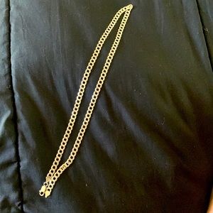 12” gold Cuban link chain. I never take it off but hey old to me new to you?